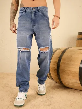 Mid Wash Blue Knee Ripped Relaxed Tapered Fit Jeans